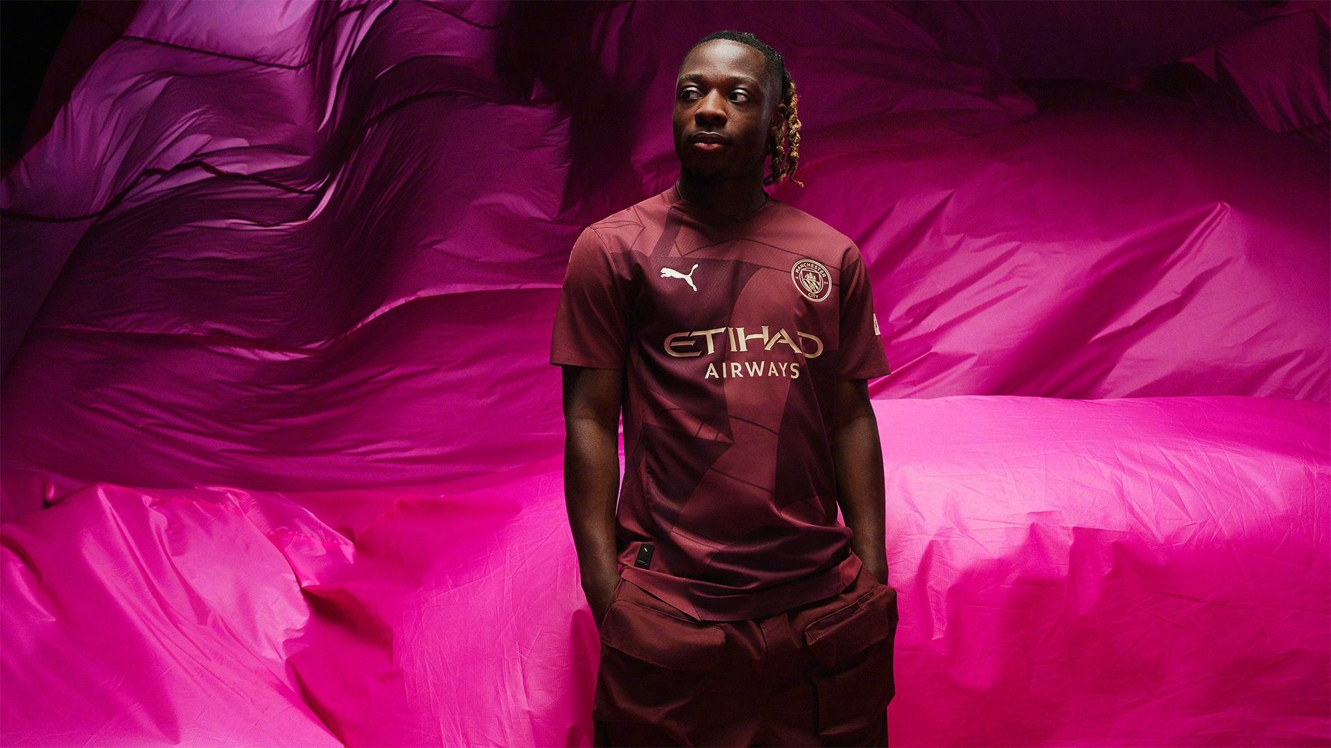 Manchester City Unveils Second Away Kit: Burgundy with Golden Accents