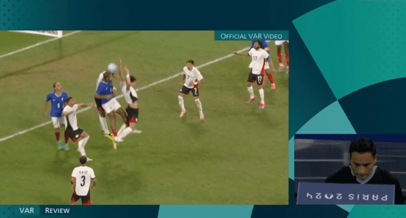 Fayed Handles the Ball in the Box; Referee Awards Extra Time after Reviewing French Defender's Foul First