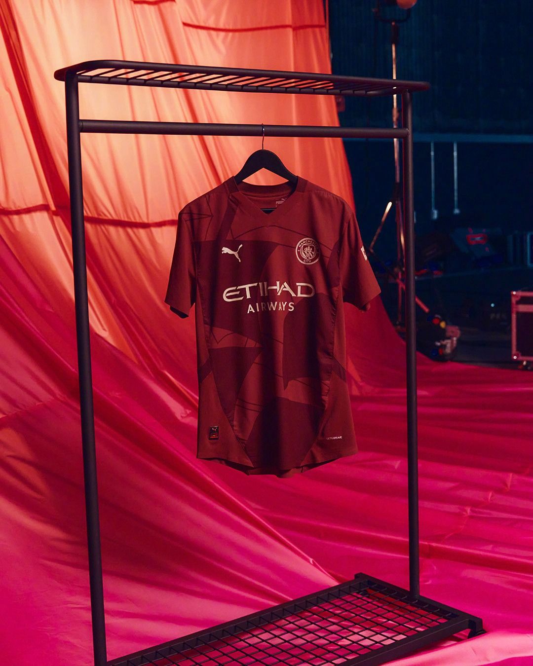 Manchester City Unveils Second Away Kit: Burgundy with Golden Accents