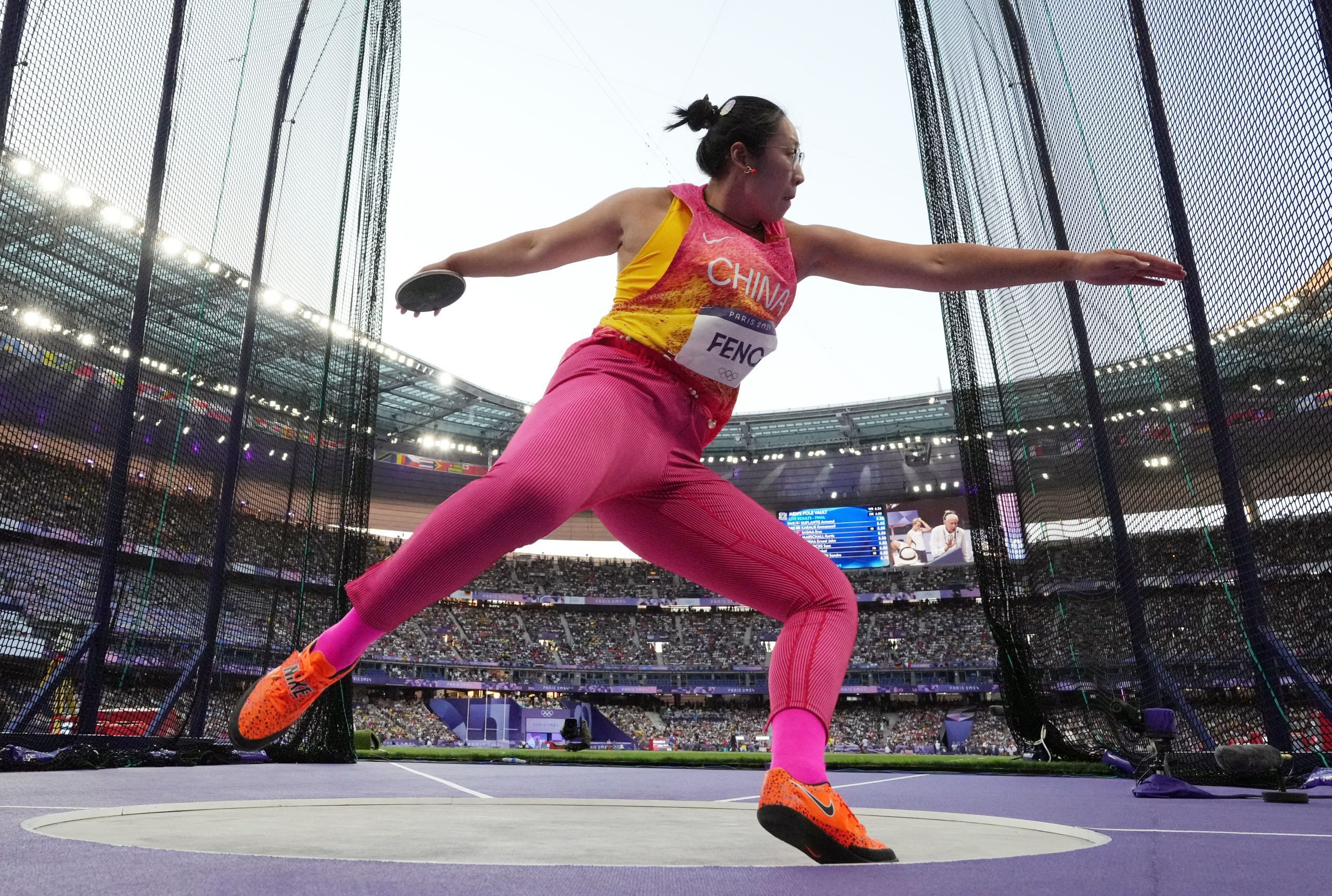 Women's Discus Final: Chinese Athlete Feng Bin Claims Silver as American Alman Successfully Defends Title