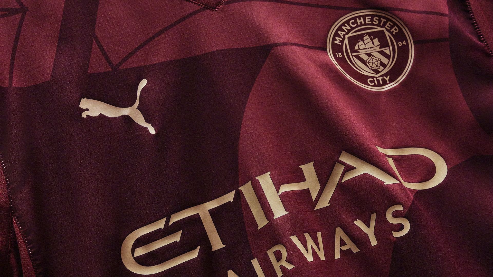 Manchester City Unveils Second Away Kit: Burgundy with Golden Accents