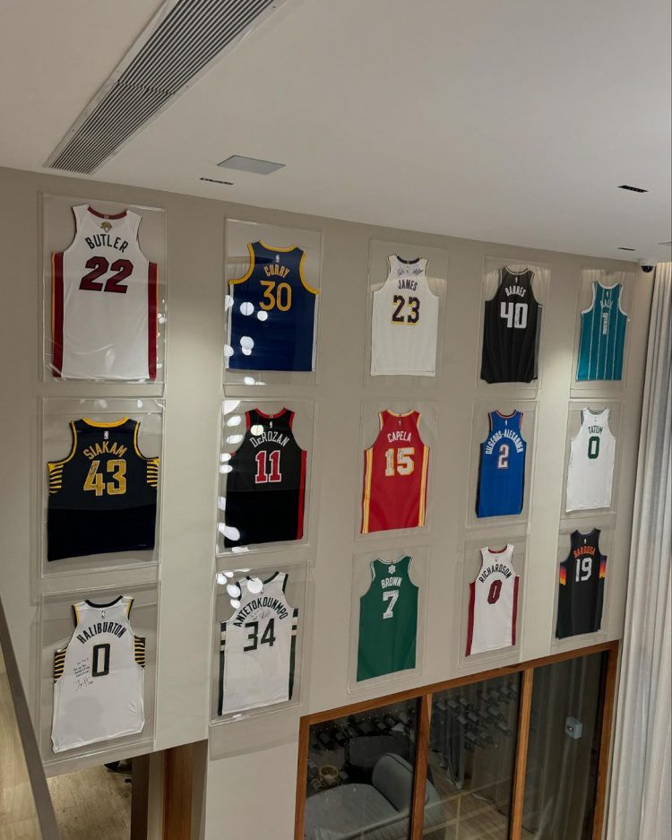 A Wall of Trophies! Real Madrid Star Vinicius Jr. Shares a Wall of NBA Player Signed Jerseys on Social Media