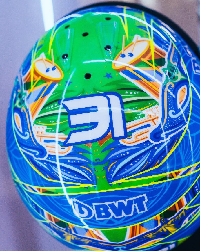 F1 Driver Ocon's Special Edition Helmet for the São Paulo Grand Prix: Yellow and Green with a Samba Flair